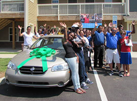 Photo of the car blessing ceremony for Chris